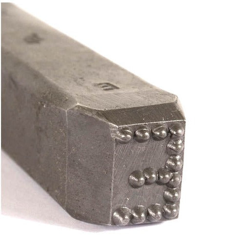 Closeup view of individual Low Stress Dot-Style Alphabet Stamp