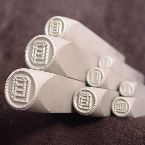 Low Stress Stamps for Metal