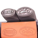 Two Custom Handheld Steel Maker Stamps and stamped marks